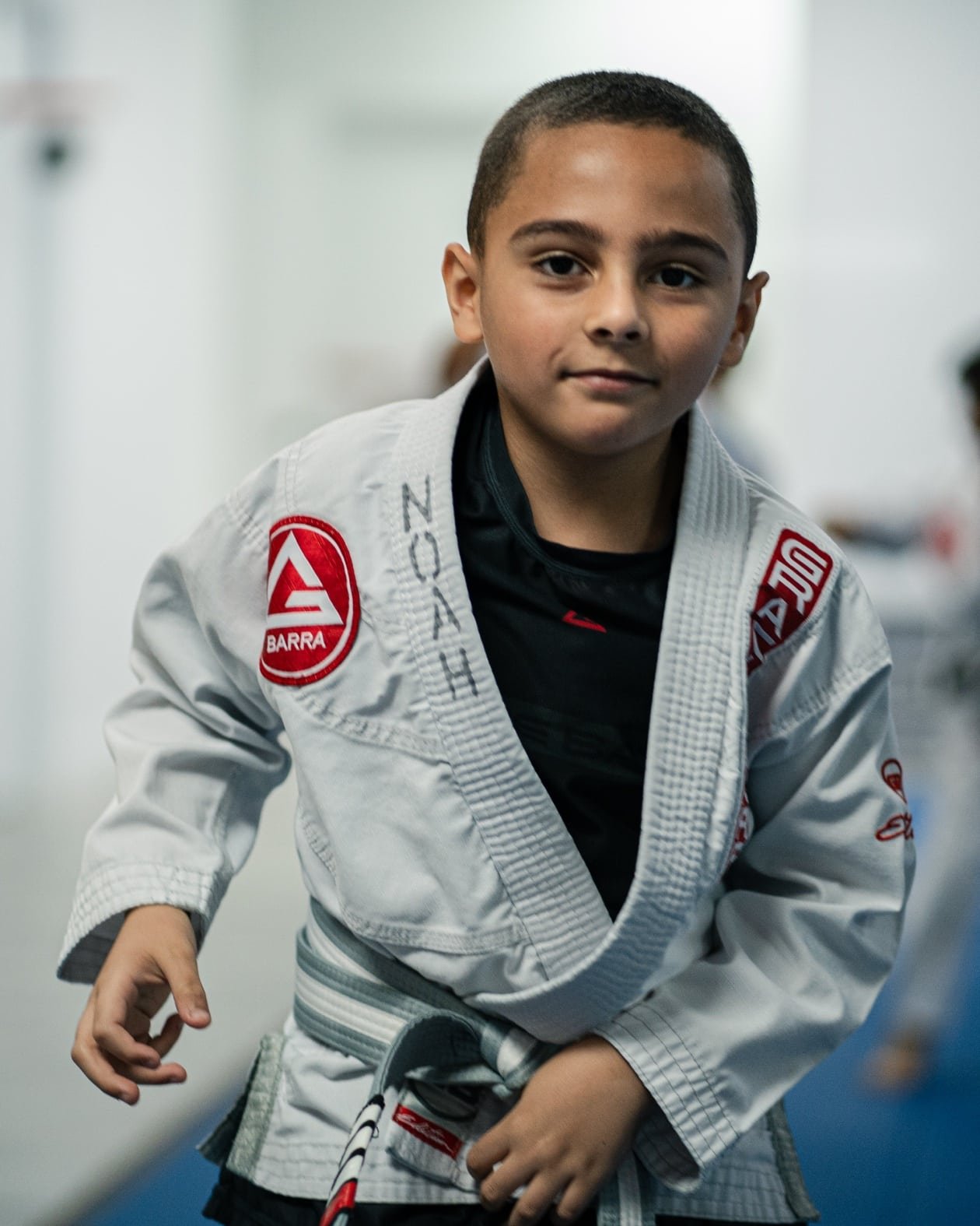 Young student in a white gi